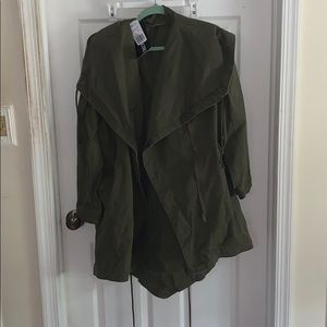 Green military jacket with zippers